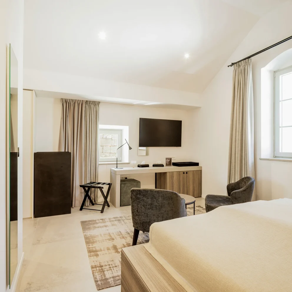 Spacious double room interior with sea view at Marshal Club Hotel Vis