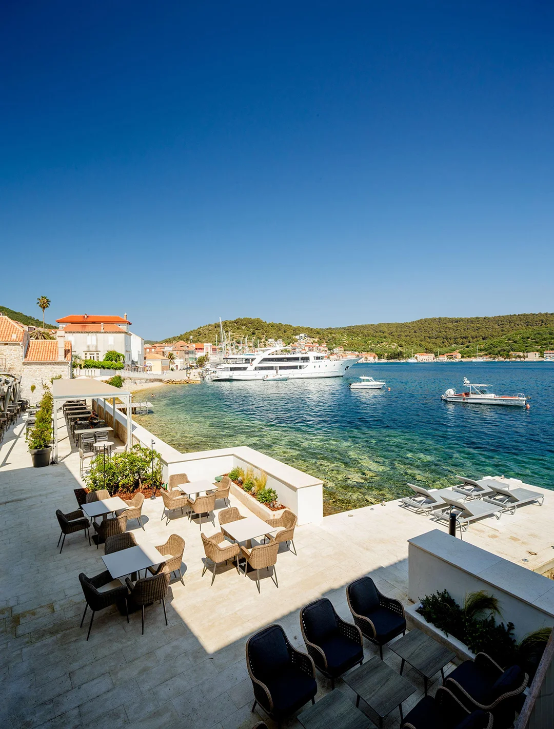 Right on the sea, in the heart of Vis. Marshal Club Hotel blends stone heritage, private beach, and bay views – for guests who love style, stories, and salty air