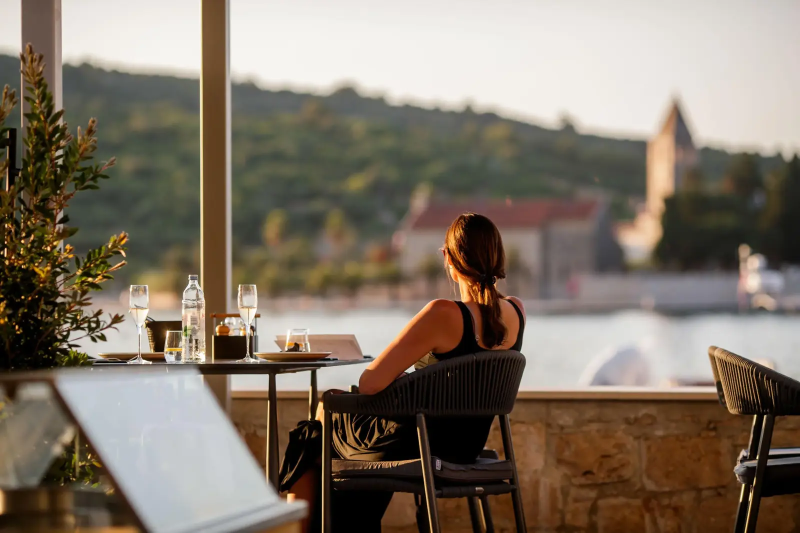 Enjoying a glass of wine with a sea view at Marshal Club Hotel Vis